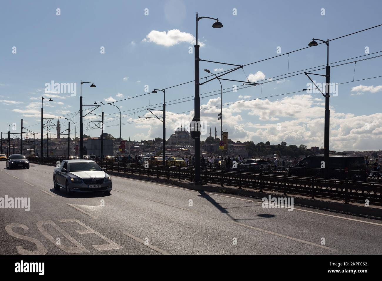View of cars passing on Galata bridge in Istanbul. Stock Photo