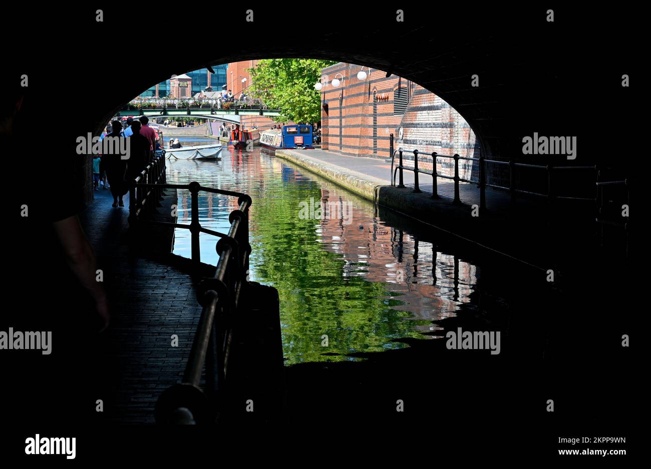 View from the tunnel below Black Sabbath Bridge  toward Gas St Basin in the centre of Birmingham's Canal system Stock Photo