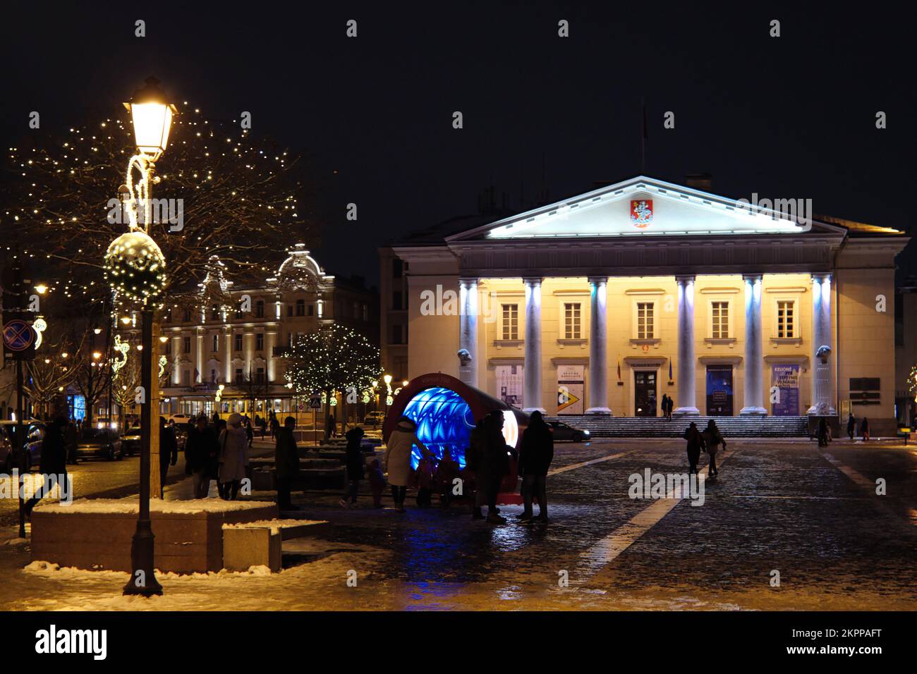 Vilnius, Lithuania - November 27, 2022: Christmas in Vilnius. The Town Hall square, Lithuanian Vilniaus rotuse at night time Stock Photo