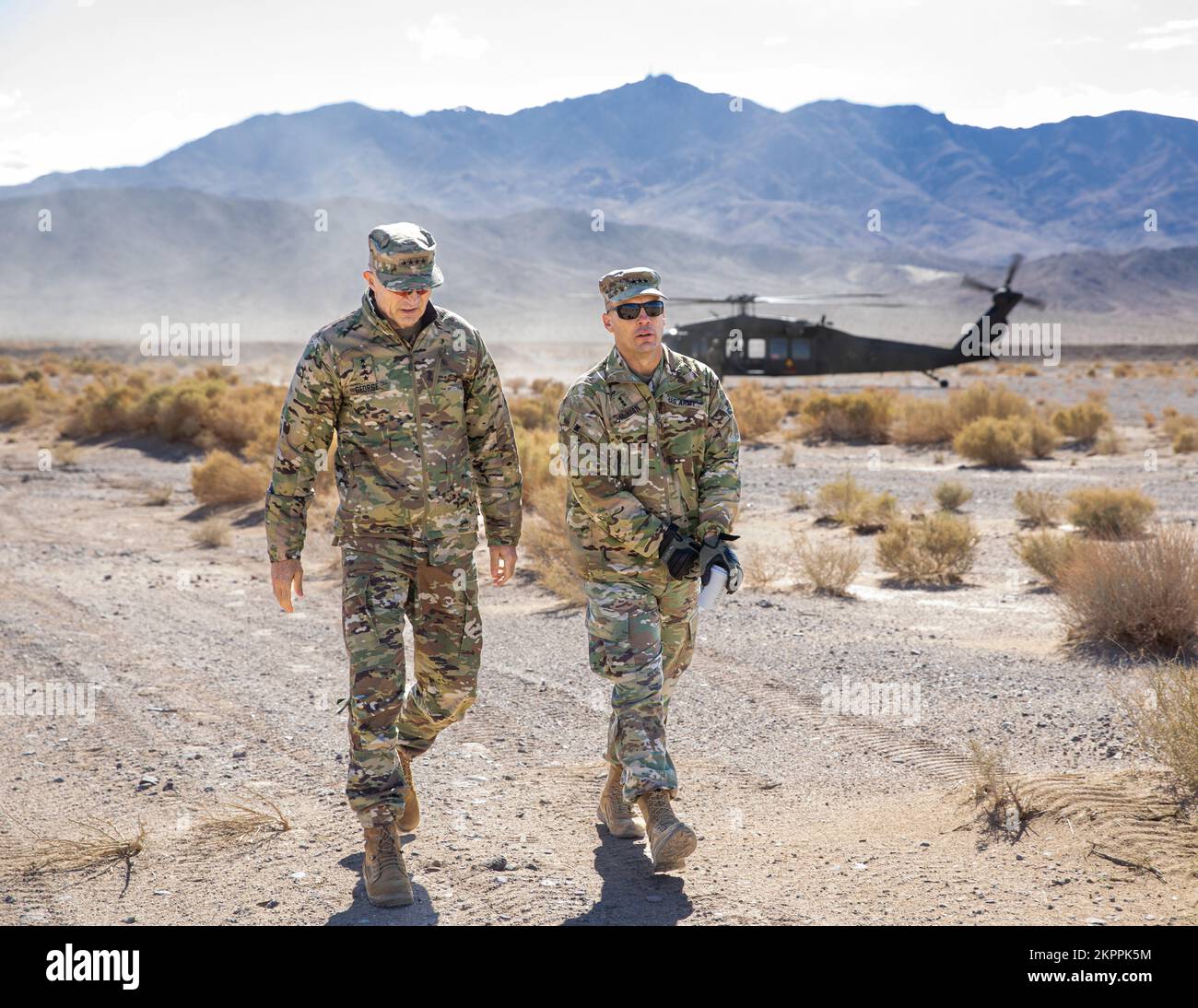 Gen. Randy George, Vice Chief of Staff of the Army, and Lt. Gen Scott McKean, deputy commanding general for U.S. Army Futures Command, talk about Project Convergence 2022 Nov. 3, Fort Irwin, California. Project Convergence is an All-Service and Multinational effort to test and integrate emerging technologies. Stock Photo