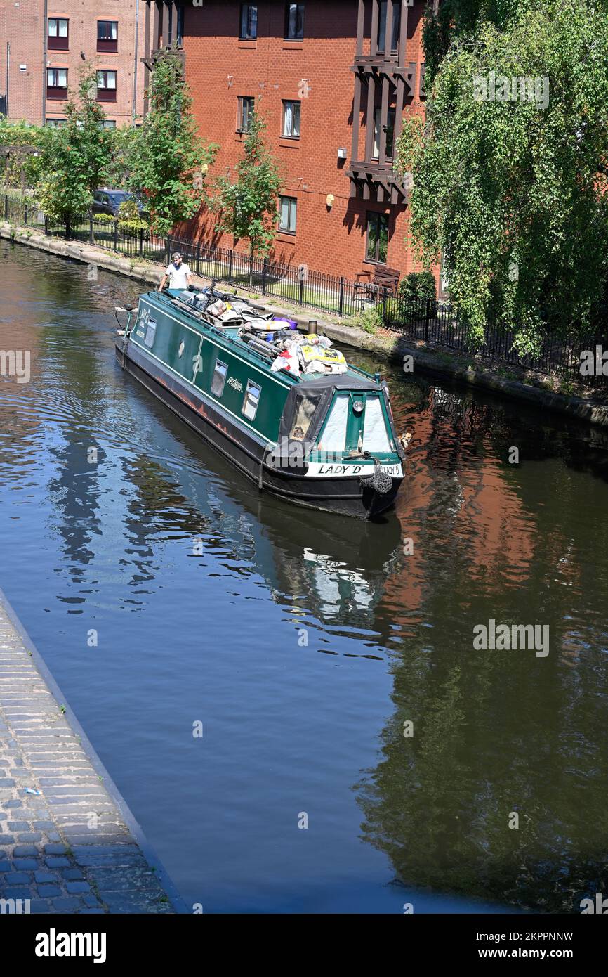 Working barge on the Birmingham UK Canals near Birmingham city centre Stock Photo