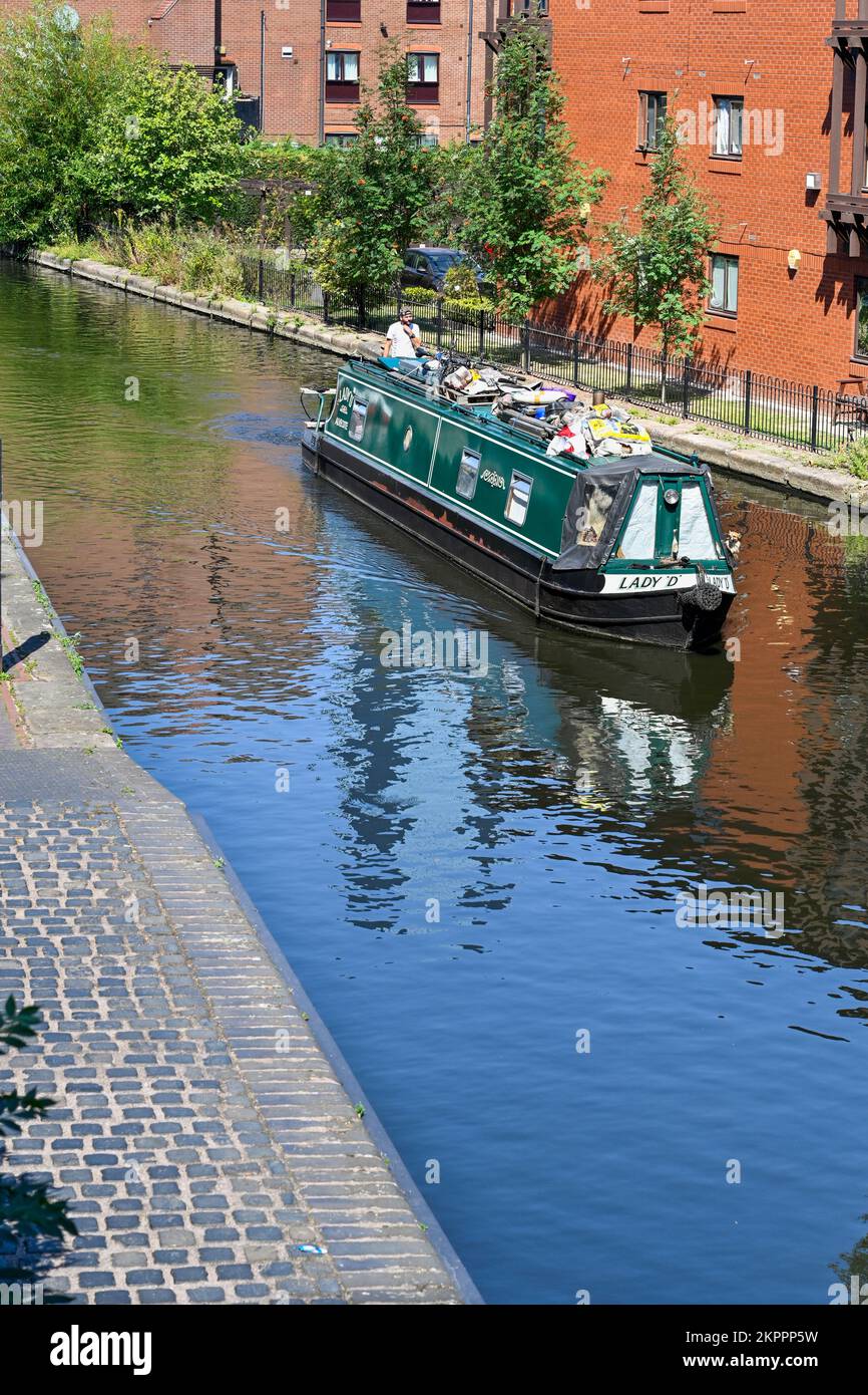 Working barge on the Birmingham UK Canals near Birmingham city centre Stock Photo