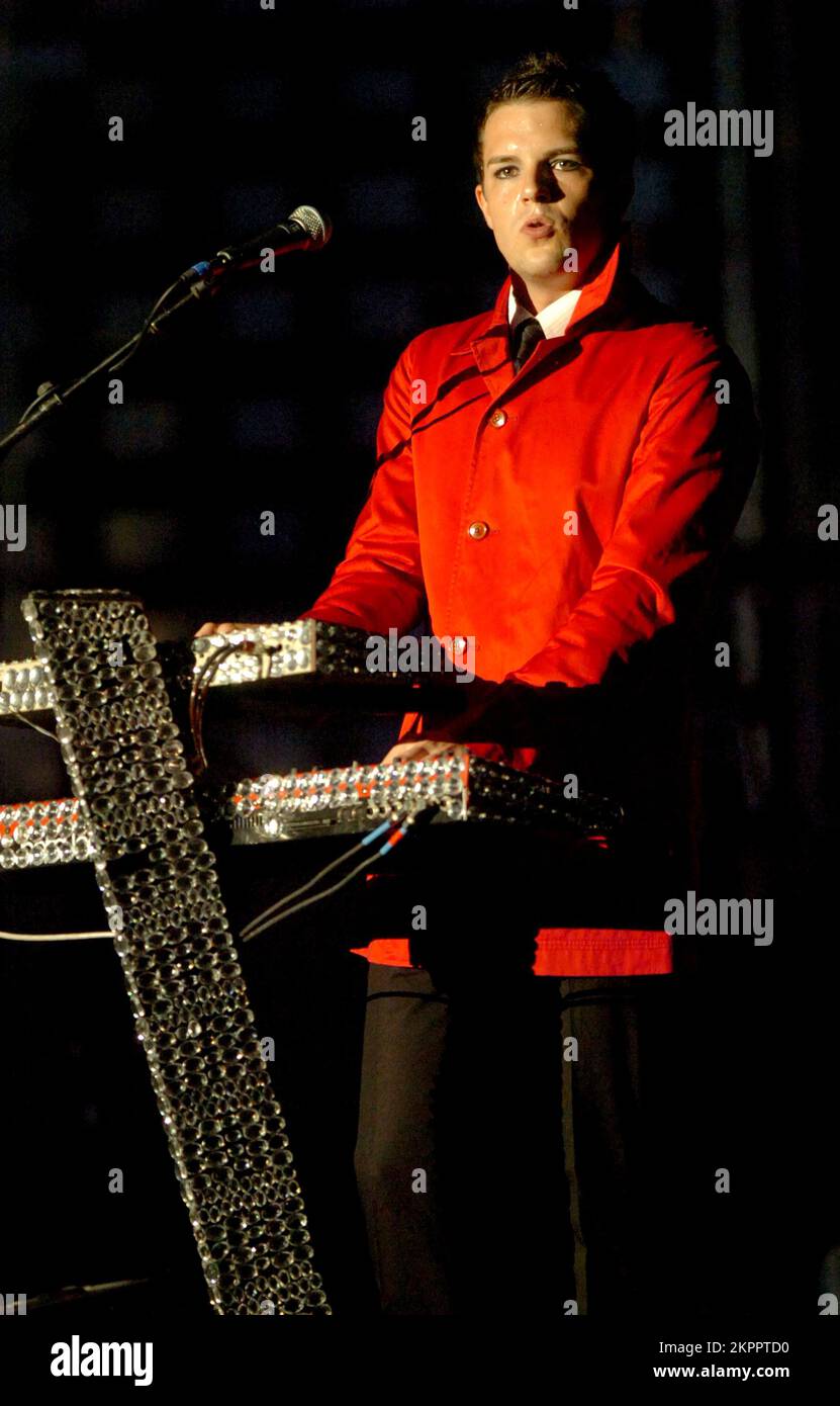 THE KILLERS singer BRANDON FLOWERS playing support to U2 at the Millennium Stadium in Cardiff, June 29 2005. Photograph: ROB WATKINS.  INFO: The Killers are an American rock band formed in Las Vegas in 2001. Known for their energetic sound and hits like 'Mr. Brightside,' they gained fame with their debut album 'Hot Fuss' and have remained influential in indie and alternative rock. Stock Photo