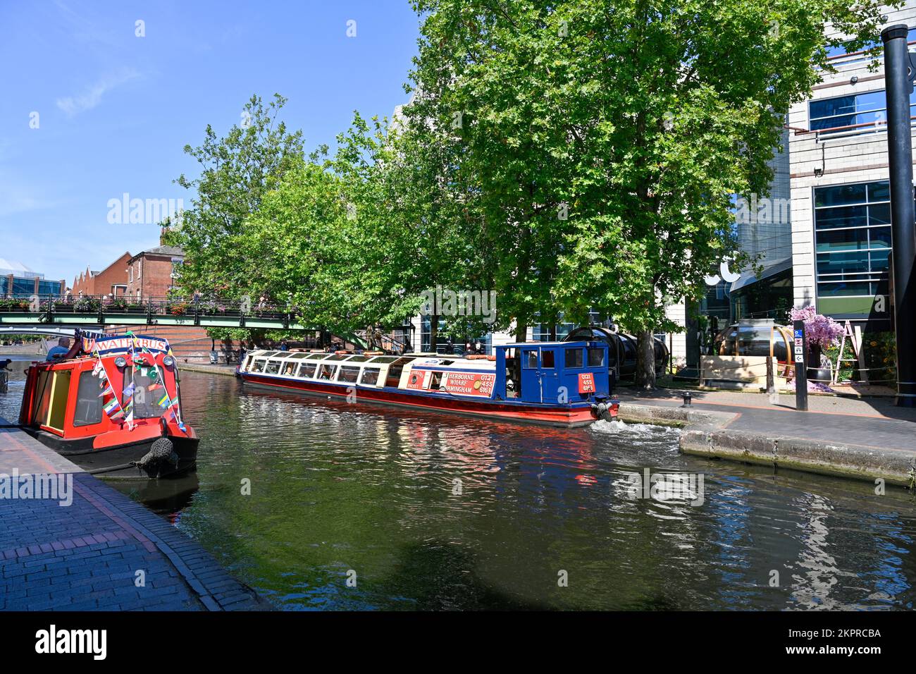Pleasure barges on Birmingham inner city Canal system approaching the Gas St Basin Stock Photo