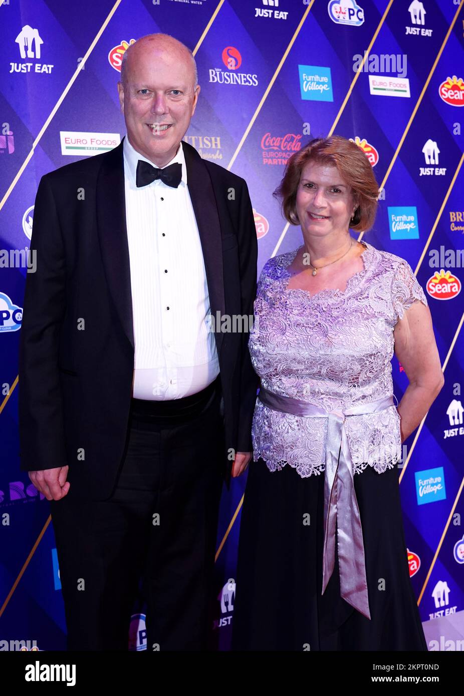 Chris Grayling and his wife Susan Clare Dillistone arrive at the British Curry Awards 2022 at Evolution London. Picture date: Monday November 28, 2022. Stock Photo