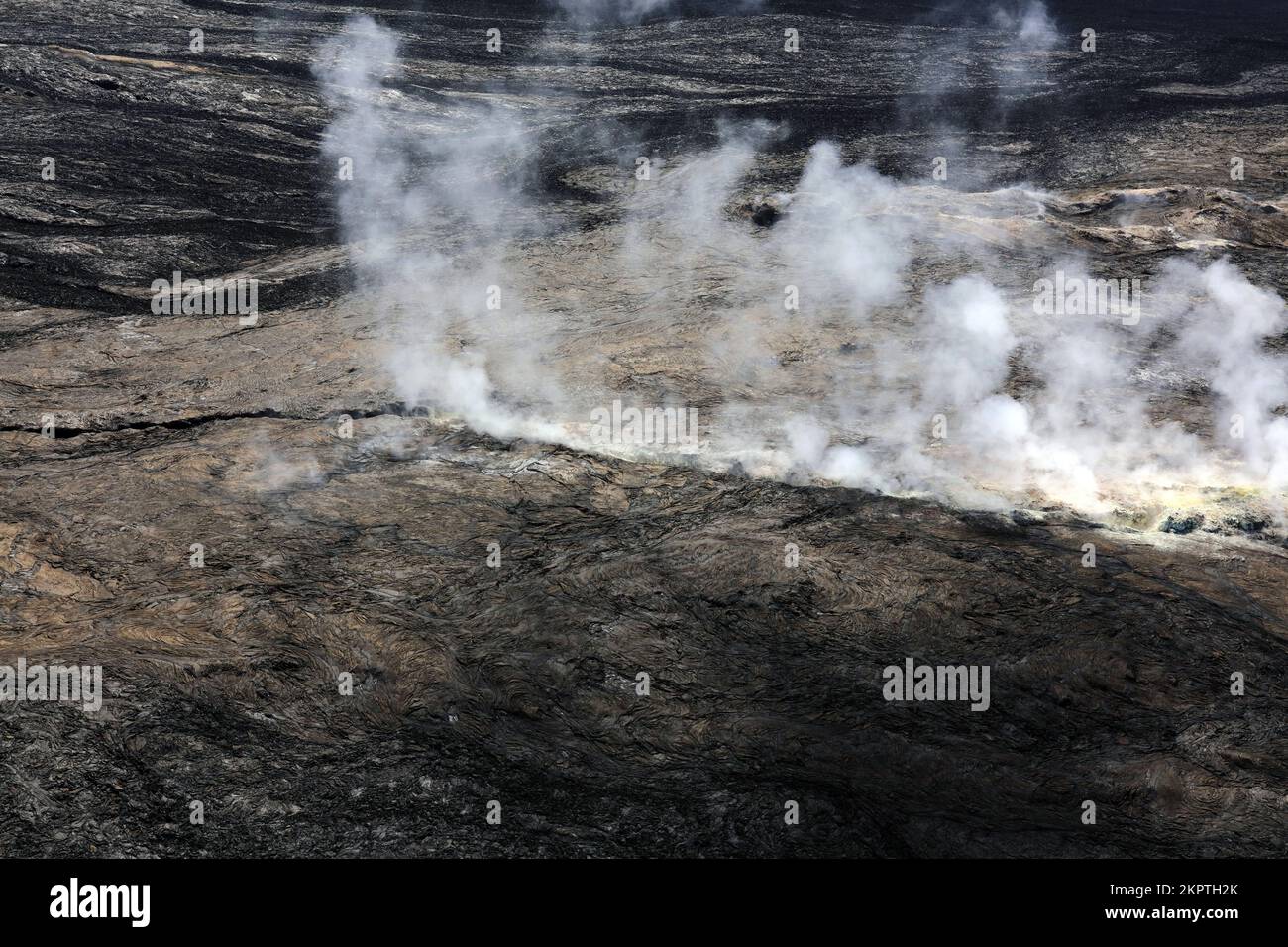 Big Island, Hawaii, USA. 28th Oct, 2022. FILE: Gas issues from a crack marking the location of fissures that erupted from Mauna Loa's Southwest Rift Zone in 1950. The presence of gas is normal at this location, near Sulphur Cone. Credit: K. Mulliken/USGS/ZUMA Press Wire Service/ZUMAPRESS.com/Alamy Live News Stock Photo