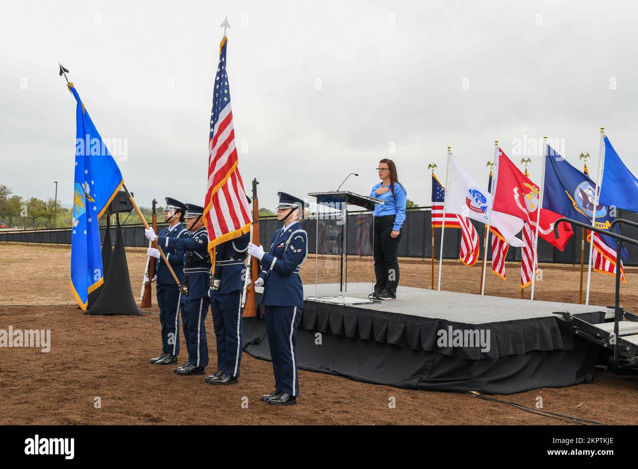 Joint Base San Antonio Honor Guard present the colors at an opening ceremony for The Wall That Heals, a 375-foot long replica of the Vietnam Veterans Memorial temporarily on exhibit at the Toyota Motor Manufacturing plant, San Antonio, Texas, on Nov. 3, 2022. The wall honors the nearly eight million Americans who served and the more than 58,000 fallen who made the ultimate sacrifice during the Vietnam War. Stock Photo
