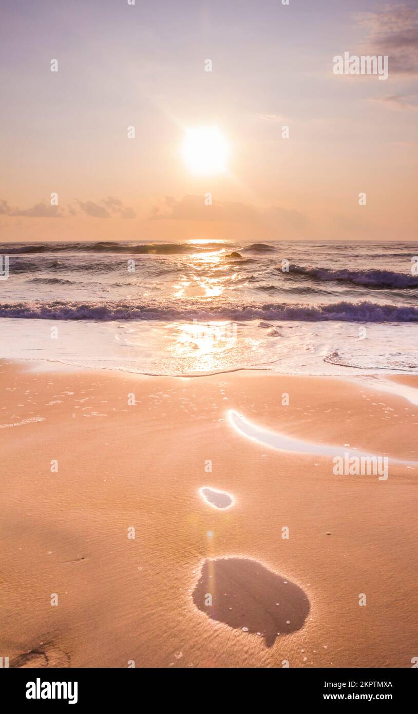 Dreamy dawn sunrise over a pristine beach location in pastel tones. Captured: Main Beach, Point Lookout, North Stradbroke Island, Queensland, Australi Stock Photo