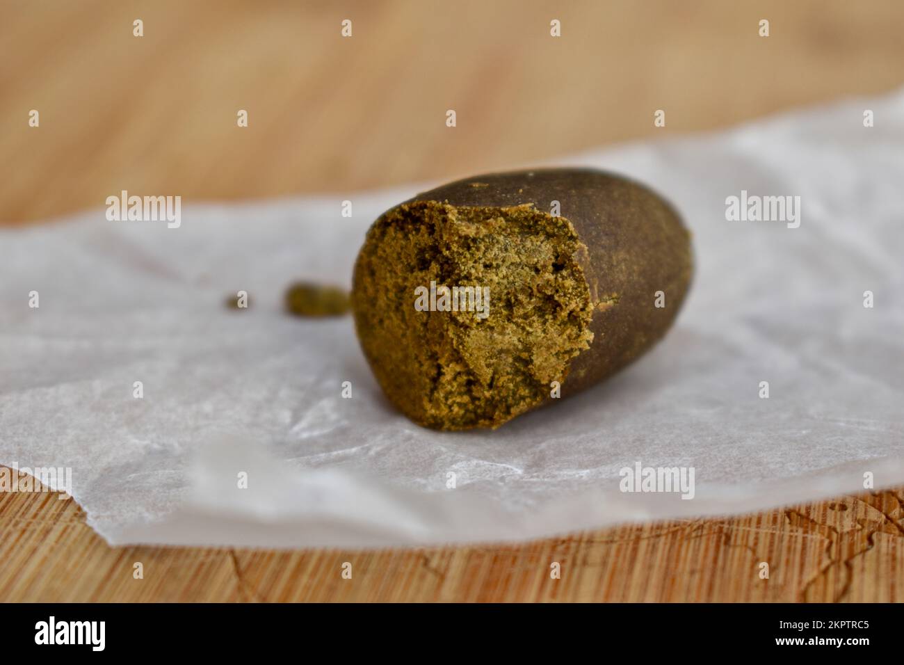 Cannabis Resin. Double Filtered Hashish Pellet. Stock Photo