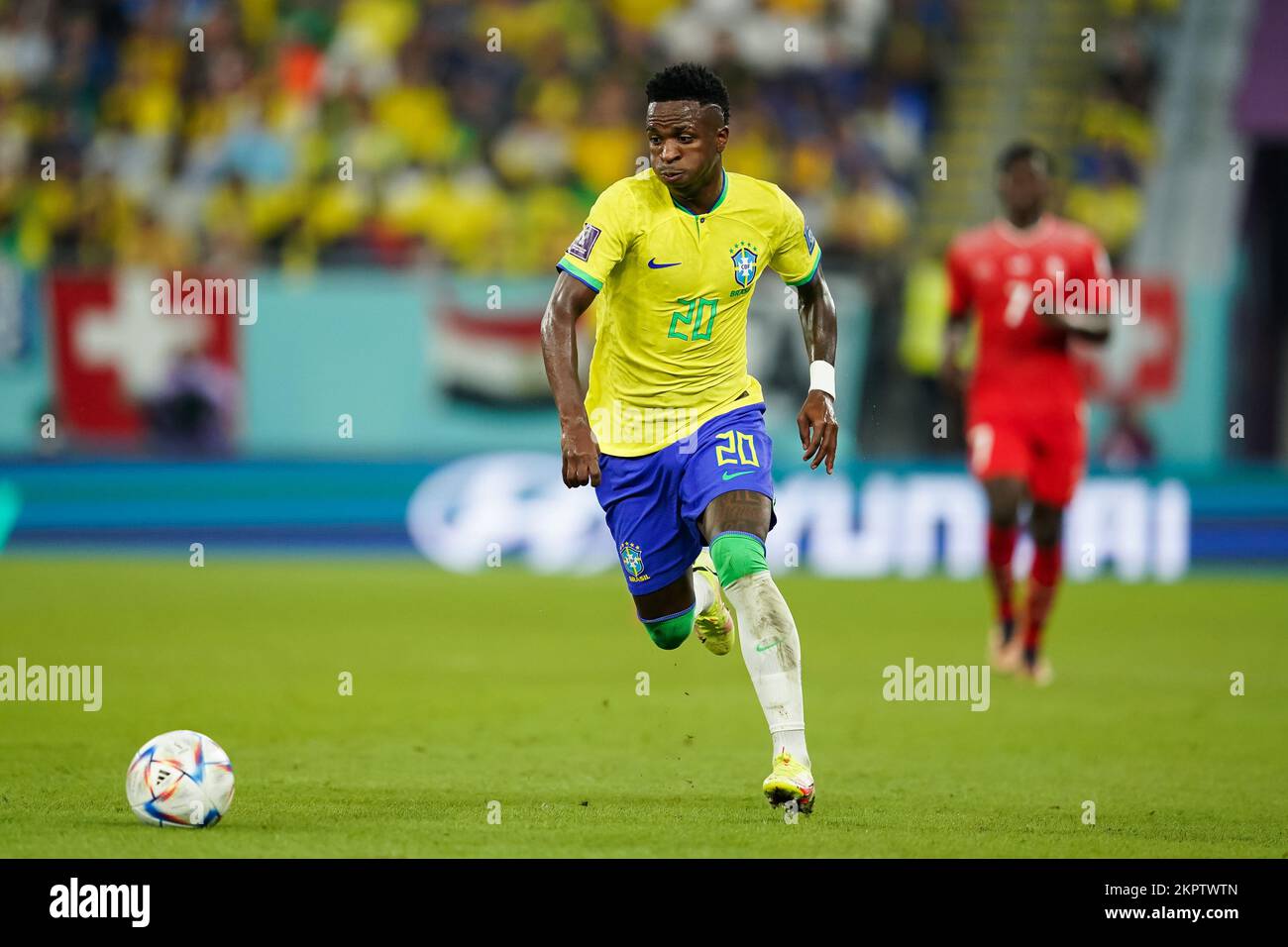 DOHA, QATAR - NOVEMBER 28: Player of Brazil Vinícius Júnior passes the ball during the FIFA World Cup Qatar 2022 group G match between Brazil and Switzerland at Stadium 974 on November 28, 2022 in Doha, Qatar. (Photo by Florencia Tan Jun/PxImages) Stock Photo