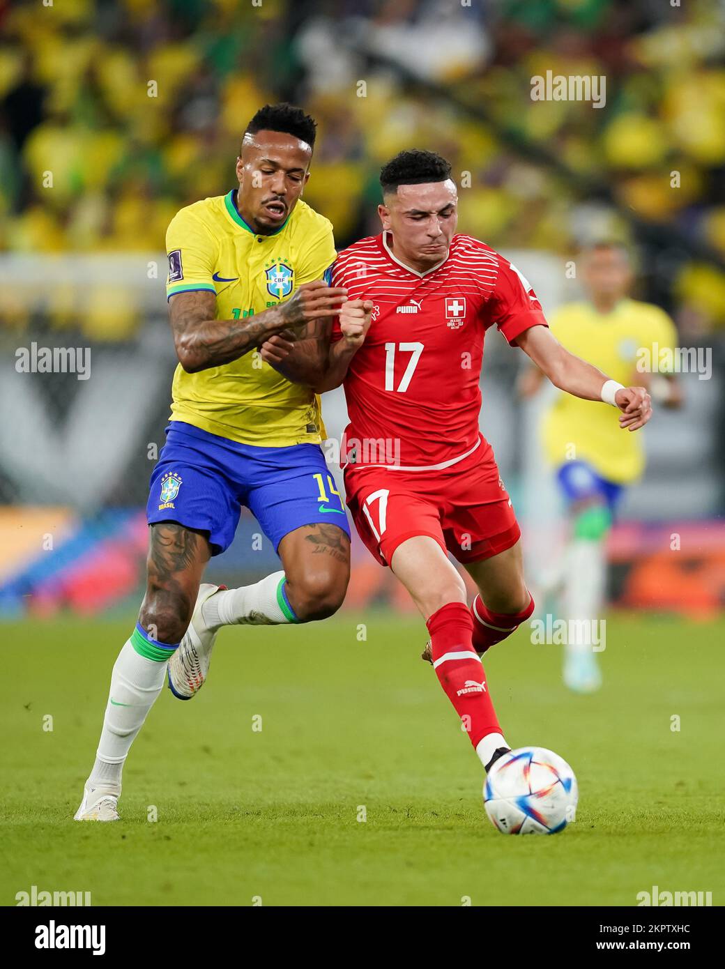 DOHA, QATAR - NOVEMBER 28: Player of Brazil Éder Militão fights for the ball with player of Switzerland Ruben Vargas during the FIFA World Cup Qatar 2022 group G match between Brazil and Switzerland at Stadium 974 on November 28, 2022 in Doha, Qatar. (Photo by Florencia Tan Jun/PxImages) Stock Photo