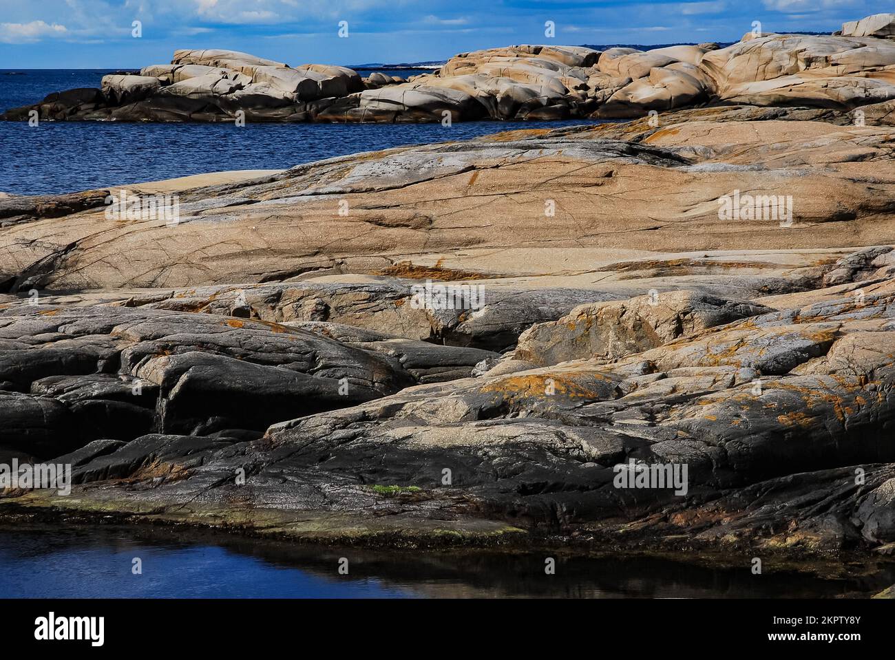 A beautiful view of the rocky coastline of a place called "The End of