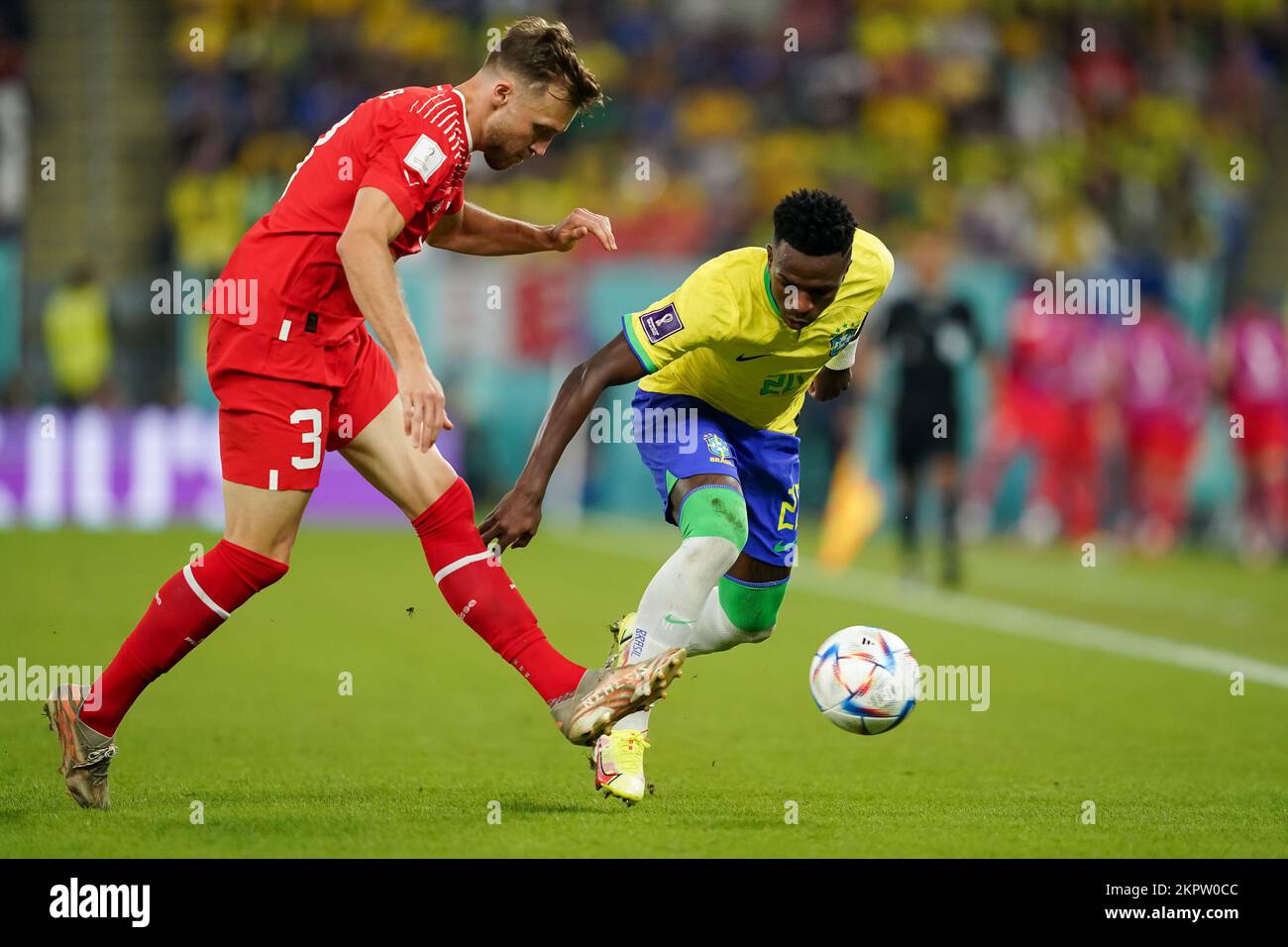 DOHA, QATAR - NOVEMBER 28: Player of Brazil Vinícius Júnior fights for the ball with player of Switzerland Silvan Widmer during the FIFA World Cup Qatar 2022 group G match between Brazil and Switzerland at Stadium 974 on November 28, 2022 in Doha, Qatar. (Photo by Florencia Tan Jun/PxImages) Stock Photo