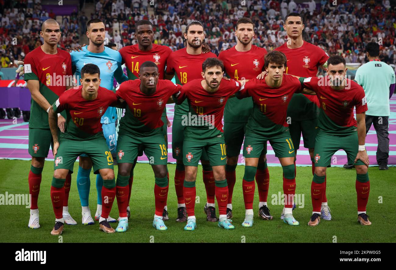 Lusail, Qatar. 28th Nov, 2022. Portuguese Pepe, Portuguese goalkeeper Diogo Costa, Portuguese William Carvalho, Portuguese Ruben Neves, Portuguese Ruben Dias, Portuguese Cristiano Ronaldo, Portuguese Joao Cancelo, Portuguese Nuno Mendes, Portuguese Bernardo Silva, Portuguese Joao Felix and Portuguese Bruno Fernandes pose for the photographer at the start of a soccer game between Portugal and Uruguay, in Group H of the FIFA 2022 World Cup in Lusail Stadium, in Lusail, State of Qatar on Monday 28 November 2022. BELGA PHOTO VIRGINIE LEFOUR Credit: Belga News Agency/Alamy Live News Stock Photo