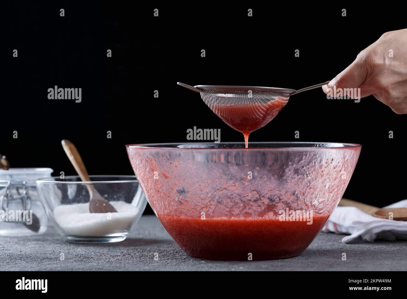 process of making strawberry jam. Home cooking, studio photo Stock