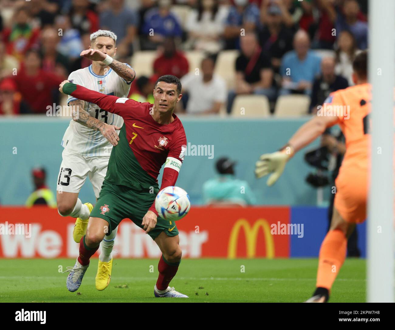 Lusail, Qatar. 28th Nov, 2022. Guillermo Varela (L) of Uruguay vies with Cristiano Ronaldo of Portugal during the Group H match between Portugal and Uruguay at the 2022 FIFA World Cup at Lusail Stadium in Lusail, Qatar, Nov. 28, 2022. Credit: Pan Yulong/Xinhua/Alamy Live News Stock Photo