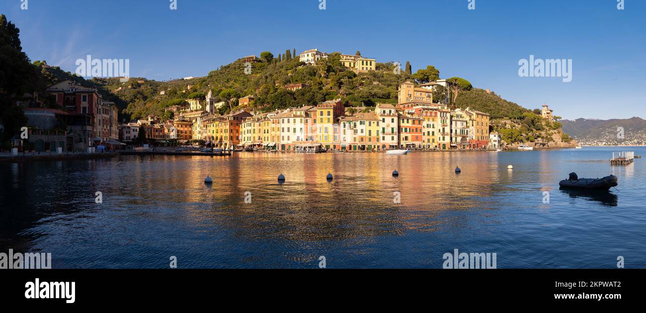 Beautiful bay with colorful houses - Portofino luxury travel destination. Village, yachts and boats in little marina. Liguria, Italy A vacation resort Stock Photo