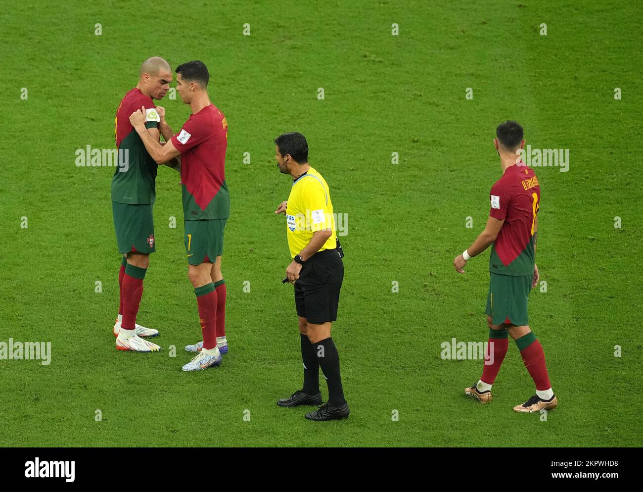 Portugal's Cristiano Ronaldo gives the captain's arm-band to team-mate Pepe after being substituted during the FIFA World Cup Group H match at the Lusail Stadium in Lusail, Qatar. Picture date: Monday November 28, 2022. Stock Photo