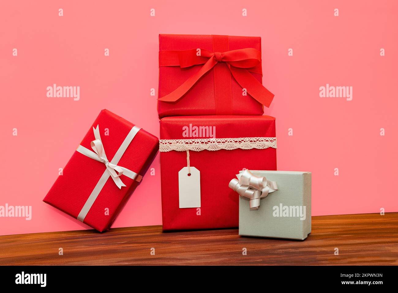 Close-up of a stack of wrapped gifts on a table Stock Photo