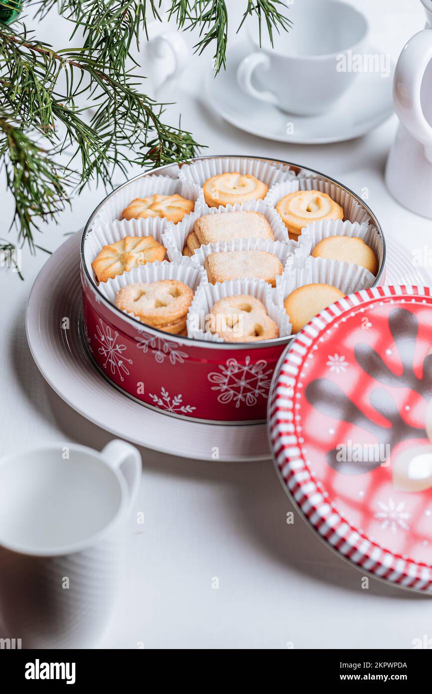 Danish butter cookies in a red Christmas tin box with the snowflakes