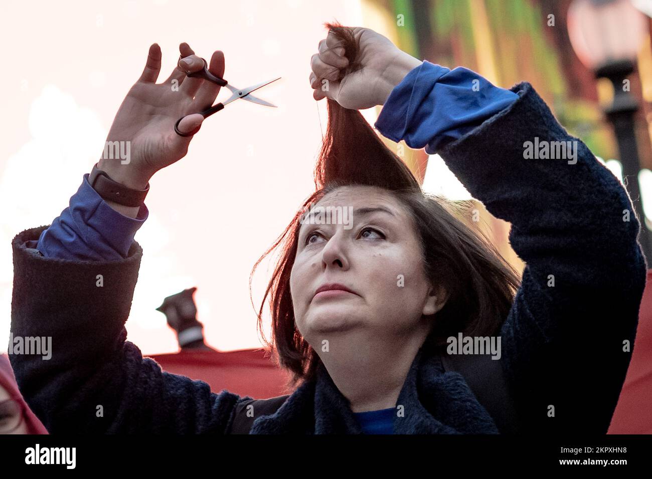 Cutting hair in protest hires stock photography and images Alamy