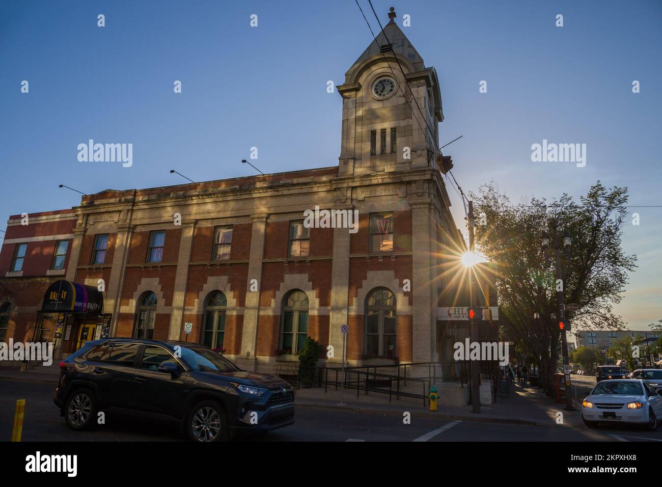 Strathcona Public Building old brick house with a tower and clock