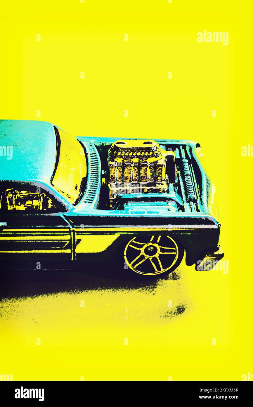 Bright auto art on a model Chevrolet impala on nostalgic yellow retro background. Sixties Automotive Stock Photo