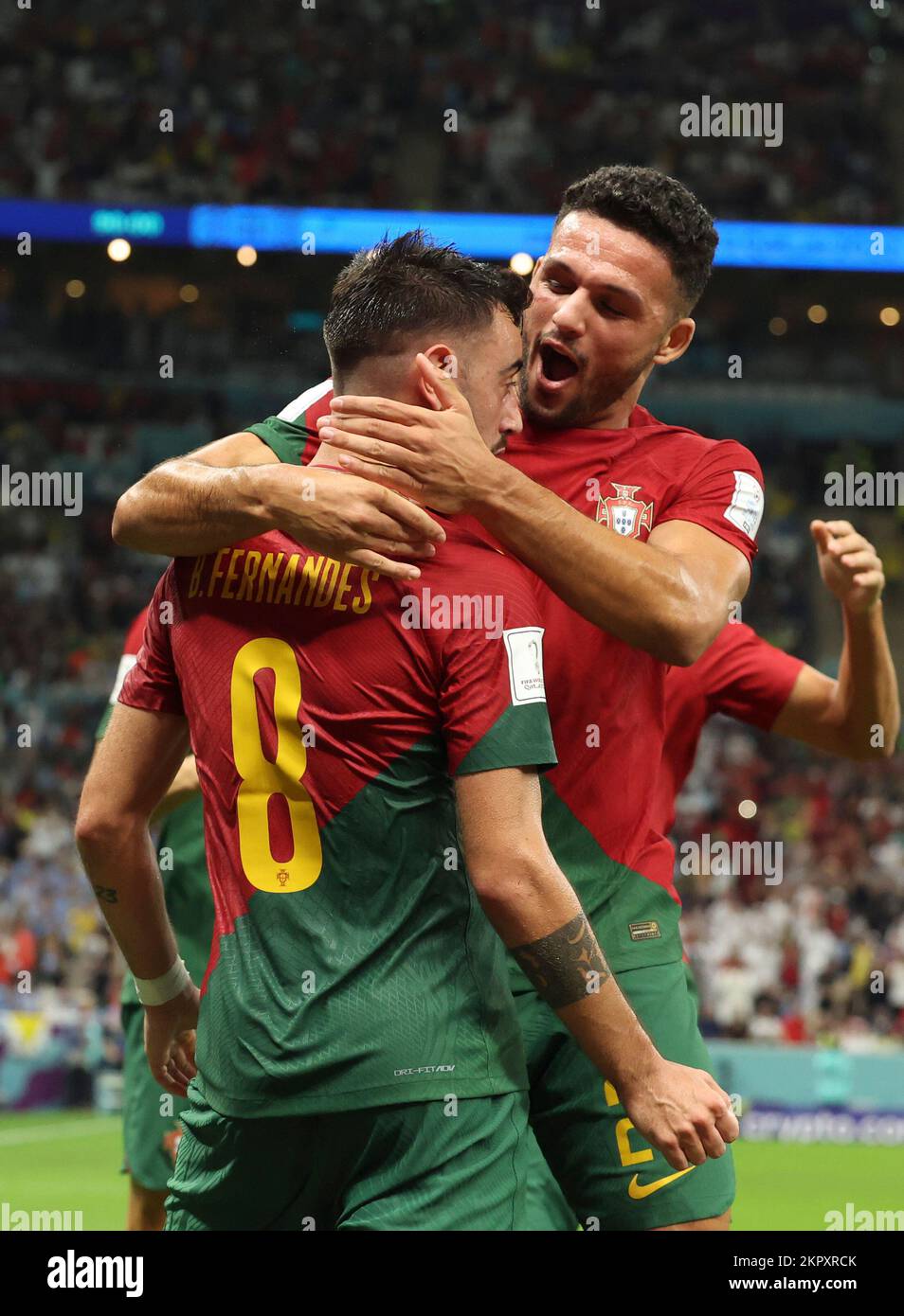 Lusail, Qatar. 28th Nov, 2022. Bruno Fernandes (L) of Portugal celebrates his penalty goal with teammate Goncalo Ramos during the Group H match between Portugal and Uruguay at the 2022 FIFA World Cup at Lusail Stadium in Lusail, Qatar, Nov. 28, 2022. Credit: Han Yan/Xinhua/Alamy Live News Stock Photo