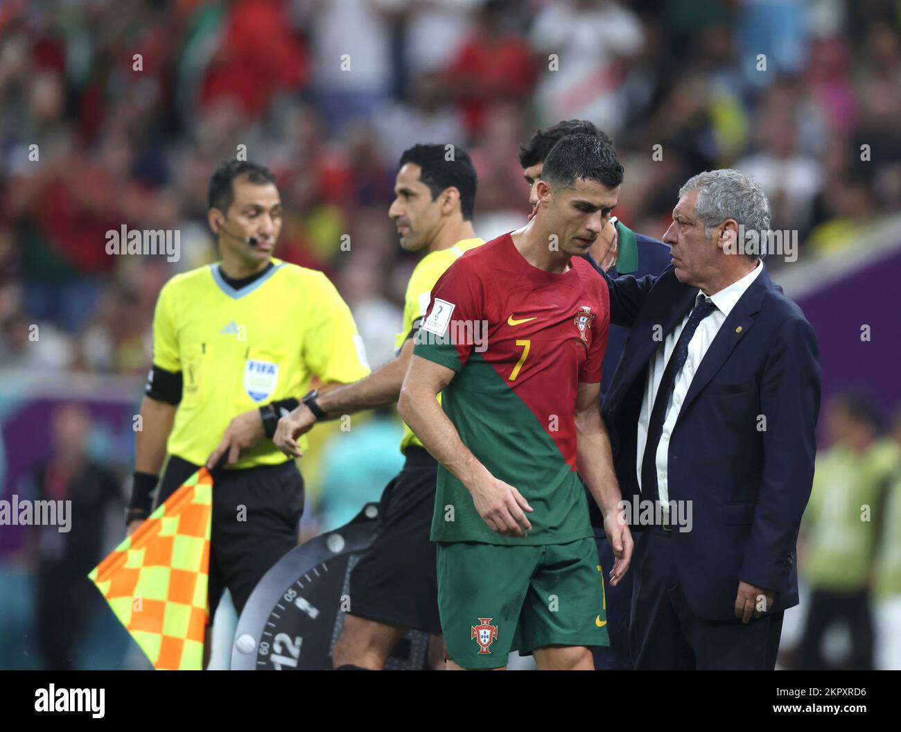 Lusail, Qatar. 28th Nov, 2022. Cristiano Ronaldo (L, front) of Portugal reacts with Fernando Santos (R, front), head coach of Portugal after being substituted during the Group H match between Portugal and Uruguay at the 2022 FIFA World Cup at Lusail Stadium in Lusail, Qatar, Nov. 28, 2022. Credit: Cao Can/Xinhua/Alamy Live News Stock Photo