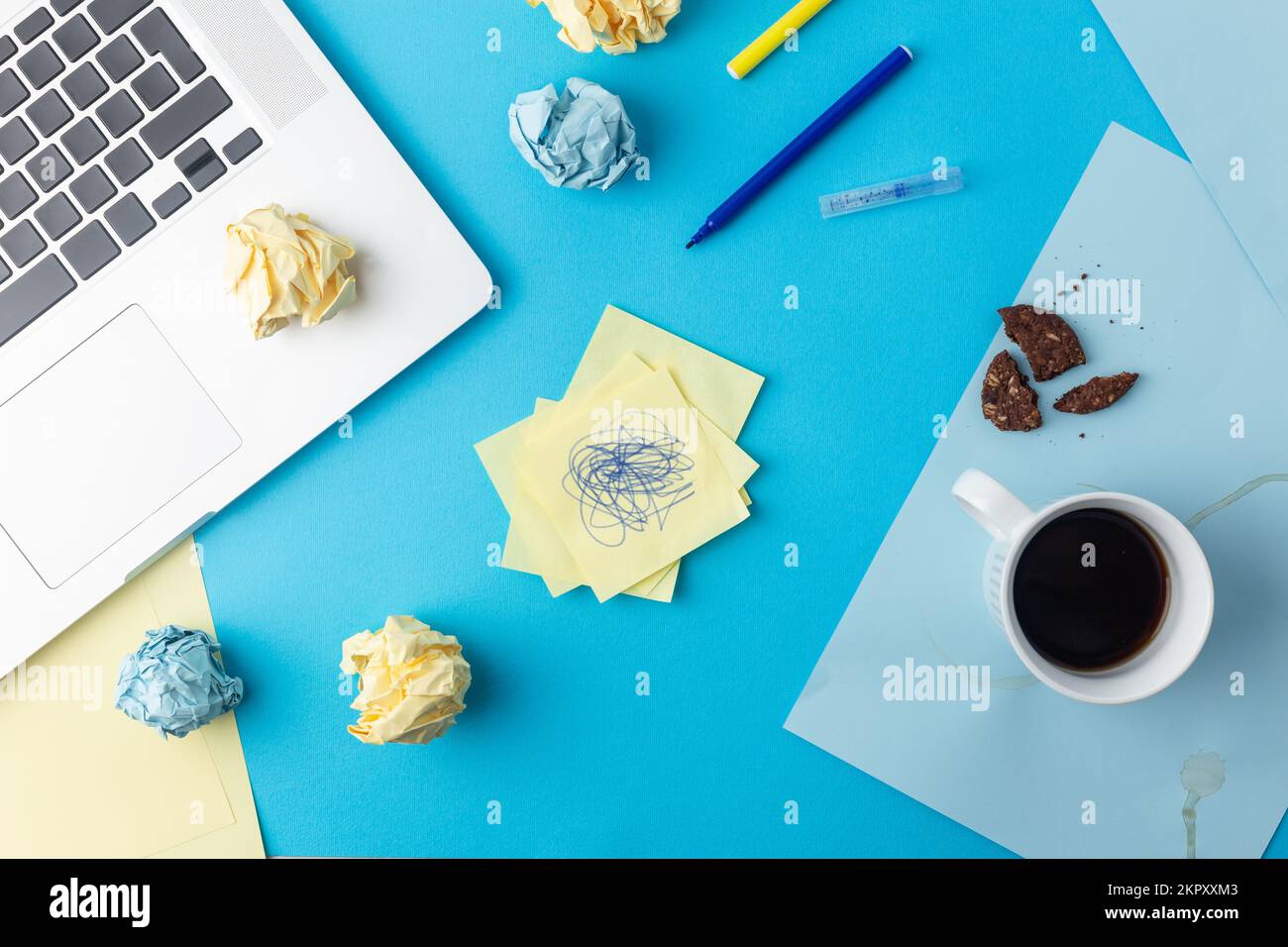 Concept of messy and chaos office desk blue and yellow Stock Photo