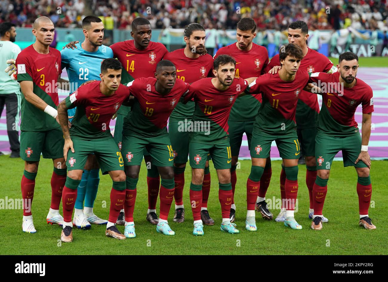 Portugal players, back row, left to right, Pepe, Diogo Costa, William Carvalho, Ruben Neves, Ruben Dias, Cristiano Ronaldo, front row, left to right, Joao Cancelo, Nuno Mendes, Bernardo Silva, Joao Felix and Bruno Fernandes line up before the FIFA World Cup Group H match at the Lusail Stadium in Lusail, Qatar. Picture date: Monday November 28, 2022. Stock Photo