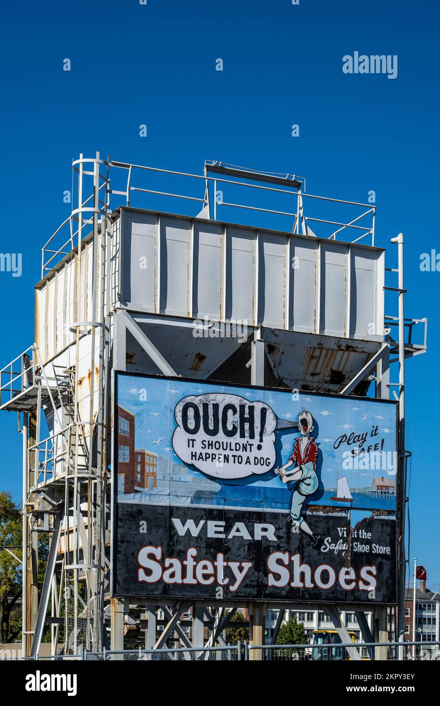 ad billboard for safety shoes at the Charlestown Navy Yard Stock Photo