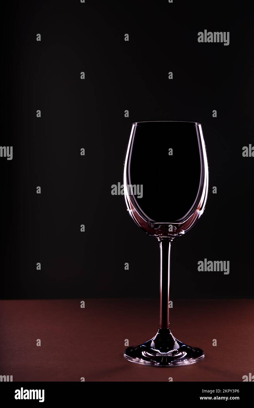Empty wine glass on black background Stock Photo