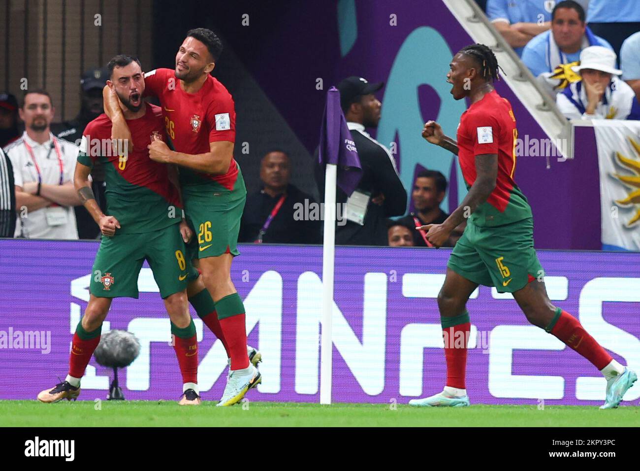 Lusail, Qatar. 28th Nov, 2022. Soccer, 2022 World Cup in Qatar, Portugal - Uruguay, Preliminary Round, Group H, Matchday 2, Lusail Stadium, Portugal's Bruno Fernandes (l) celebrates his goal to make it 2-0 with teammates Goncalo Ramos (m) and Rafael Leao. Credit: Tom Weller/dpa/Alamy Live News Stock Photo