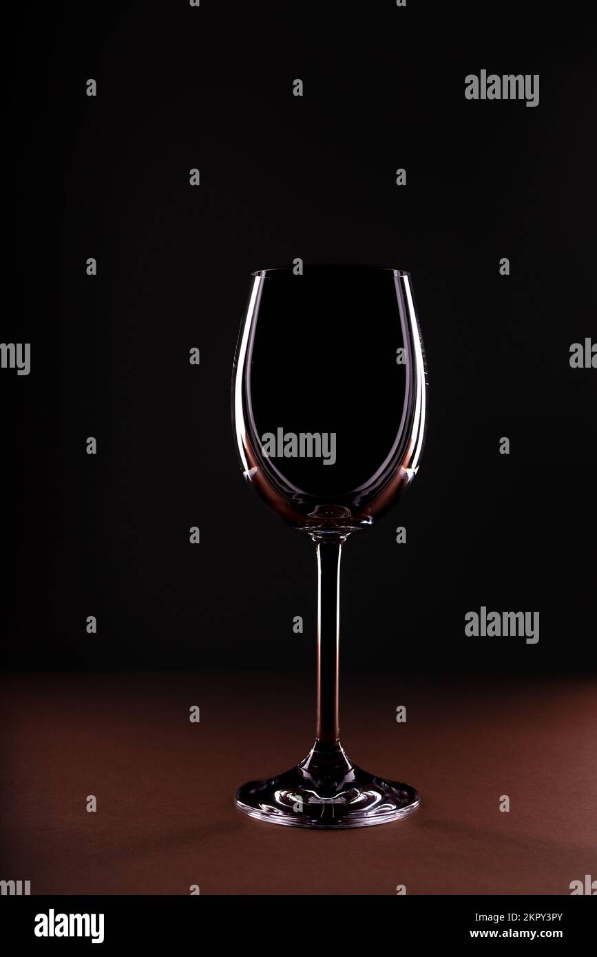 Empty wine glass on black background Stock Photo