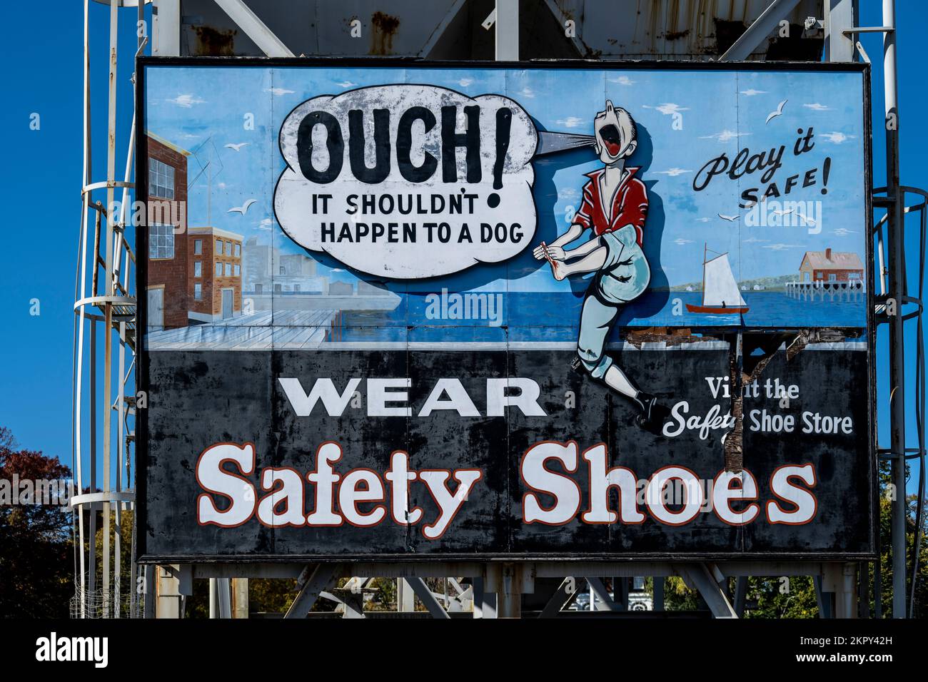 ad billboard for safety shoes at the Charlestown Navy Yard Stock Photo