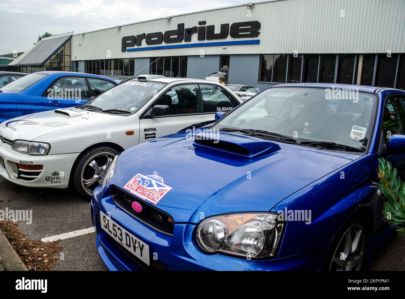 McRae Gathering. Around 1200 Subaru Impreza cars gathered at Prodrive HQ in memory of Colin McRae on anniversary of his death. Parked cars outside Stock Photo