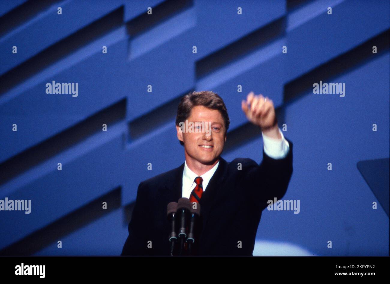 Governor Bill Clinton (Democrat of Arkansas) nominates Governor Michael Dukakis (Democrat of Massachusetts), to be the1988 Democratic Party nominee for President of the United States, at the 1988 Democratic National Convention in the Omni Coliseum in Atlanta, Georgia on July 21, 1988. Credit: Arnie Sachs/CNP Stock Photo