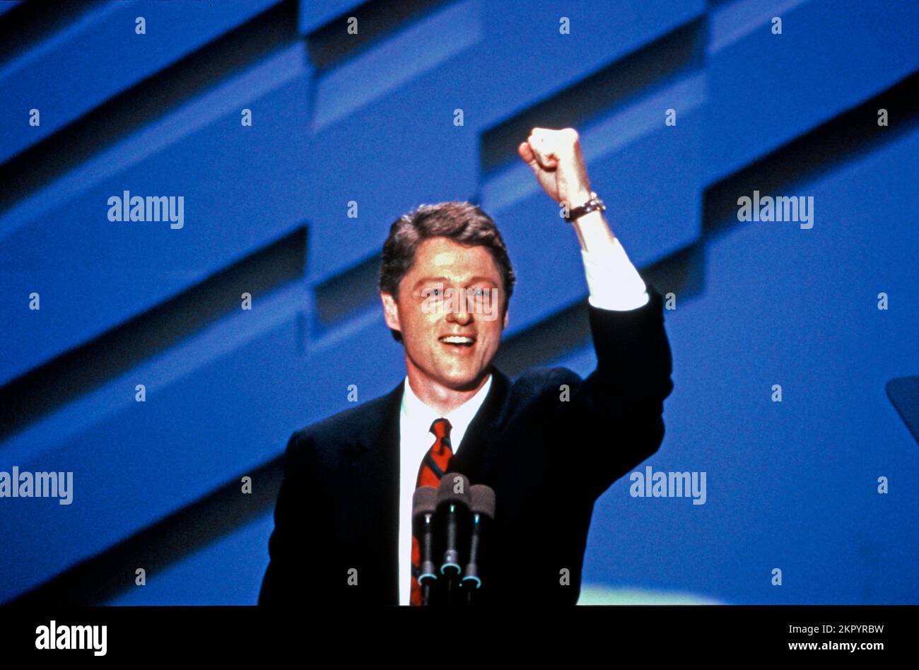 Governor Bill Clinton (Democrat of Arkansas) nominates Governor Michael Dukakis (Democrat of Massachusetts), to be the1988 Democratic Party nominee for President of the United States, at the 1988 Democratic National Convention in the Omni Coliseum in Atlanta, Georgia on July 21, 1988. Credit: Arnie Sachs/CNP Stock Photo