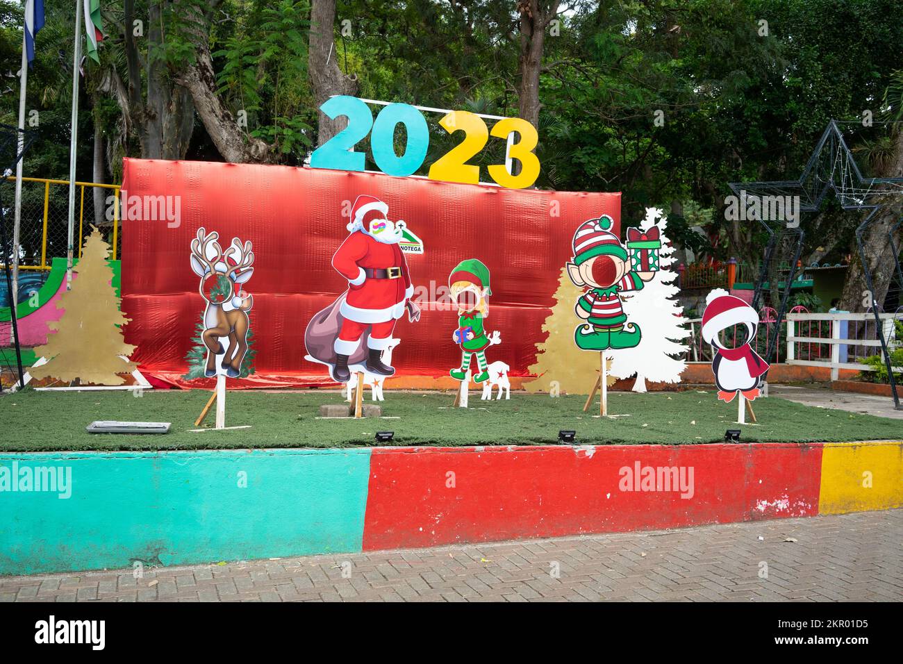 Display for photographs with holes for people's faces, Christmas in the Park, Jinotega, Nicaragua. Stock Photo