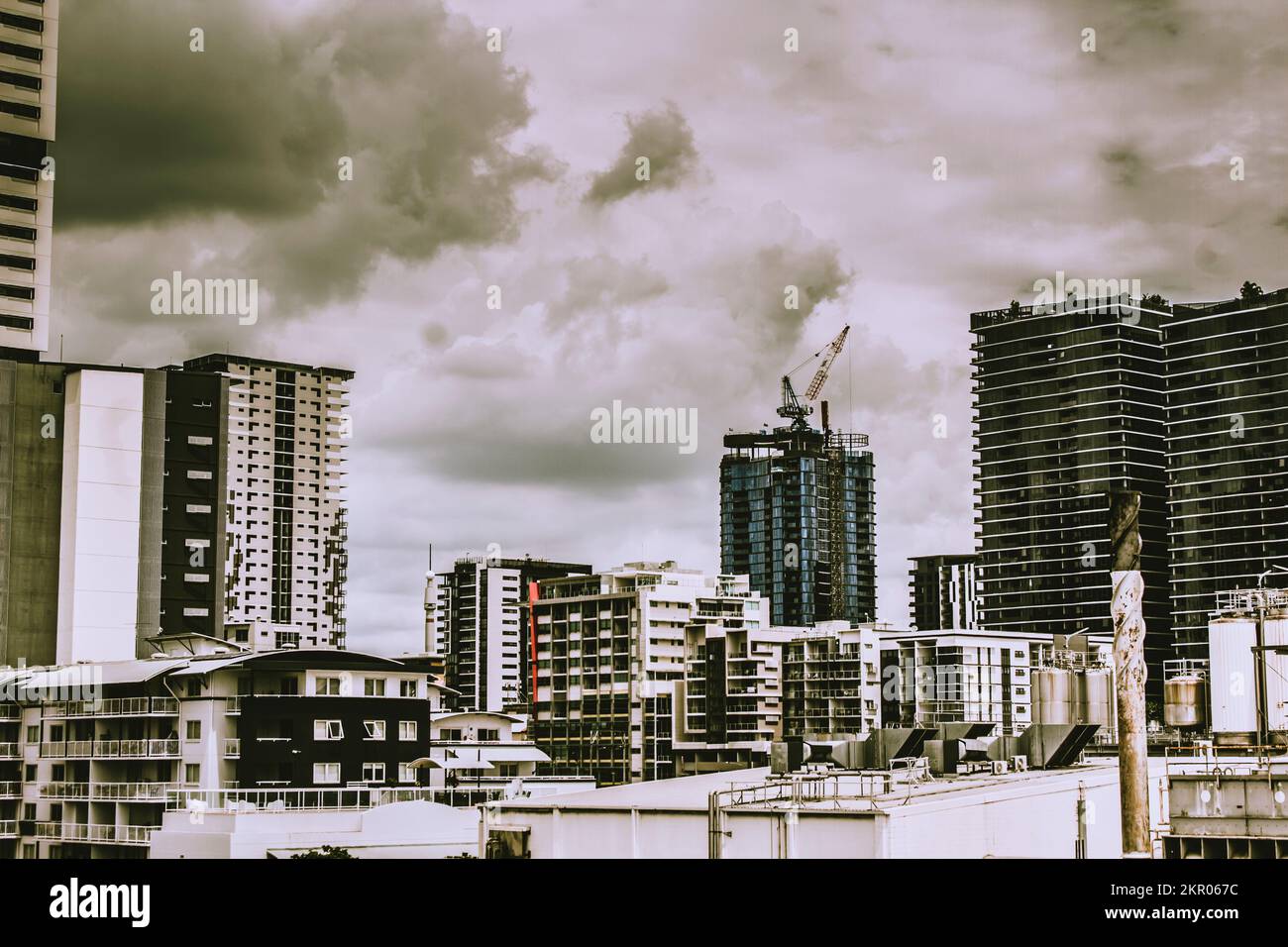 Industrial style city architecture with cranes apartments and factories