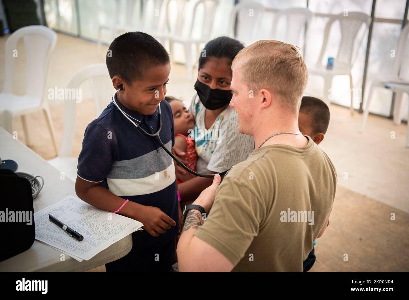 221105-N-TR141-1149 PUERTO CORTES, Honduras (Nov. 5, 2022) Hospitalman Greg Childress, from Shepherdstown, West Virginia, assigned to the hospital ship USNS Comfort (T-AH 20) for Continuing Promise 2022, takes vitals for patient intake at a medical site in Puerto Cortes, Honduras, Nov. 5, 2022. Comfort is deployed to U.S. 4th Fleet in support of CP22, a humanitarian assistance and goodwill mission conducting direct medical care, expeditionary veterinary care, and subject matter expert exchanges with five partner nations in the Caribbean, Central and South America. Stock Photo