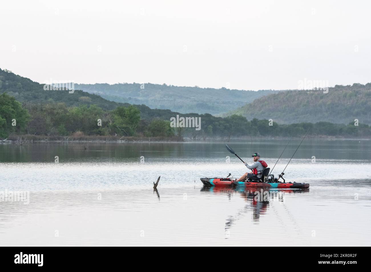 Bass fishing from a kayak on Texas lake Stock Photo Alamy