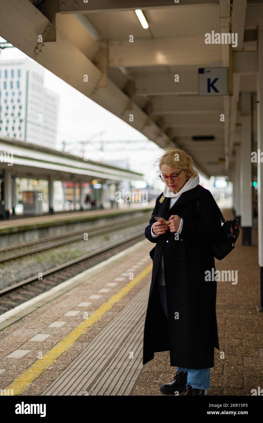 Mature woman on train station hi-res stock photography and images - Alamy