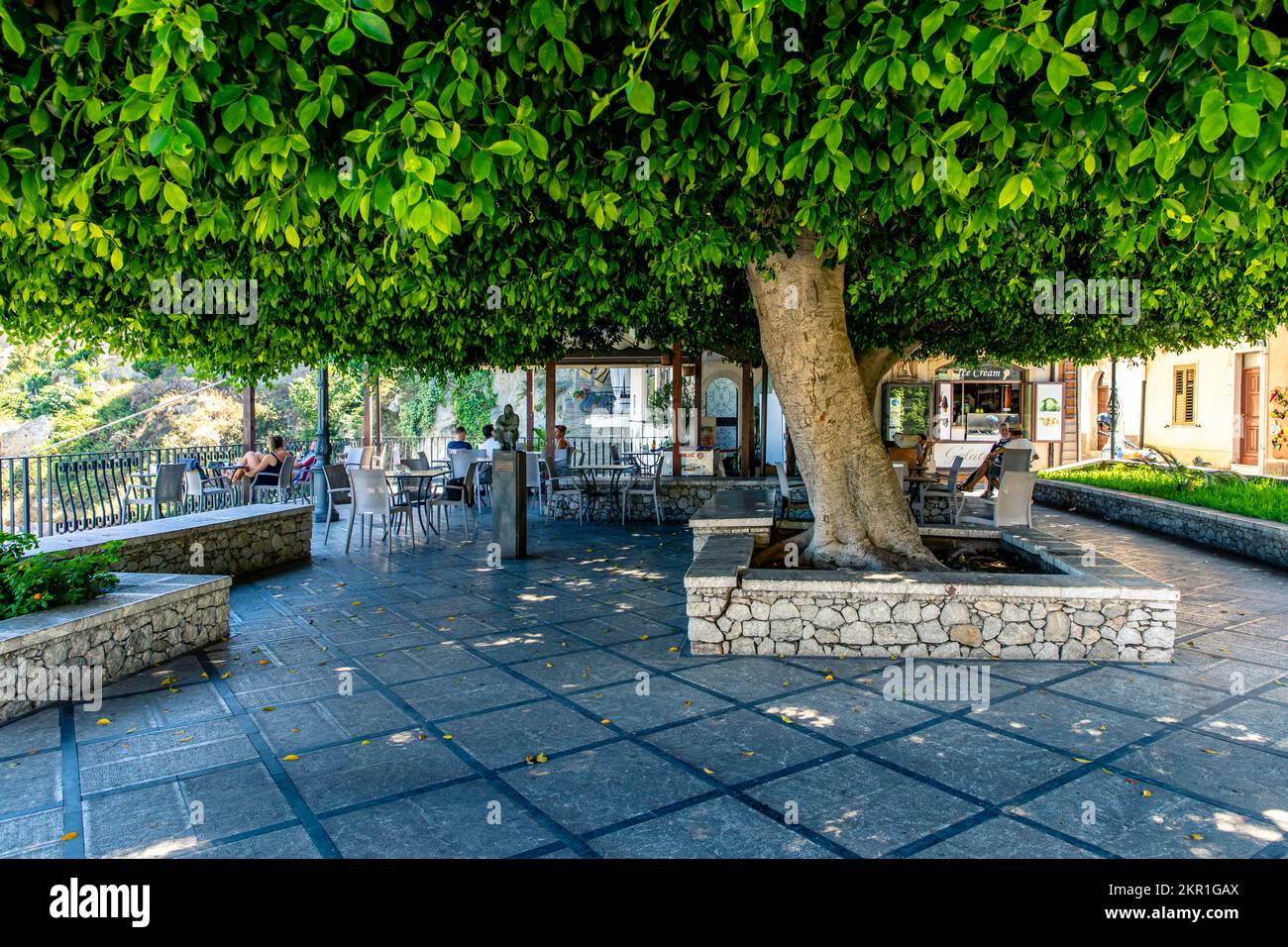 Savoca, Sicily, Italy - July 22, 2020: Cafe terrace in Savoca, Sicily, Italy Stock Photo