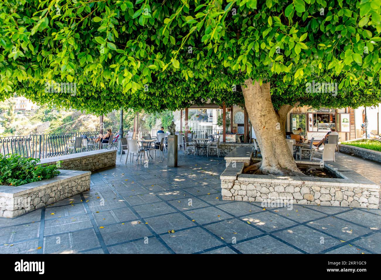 Savoca, Sicily, Italy - July 22, 2020: Cafe terrace in Savoca, Sicily, Italy Stock Photo