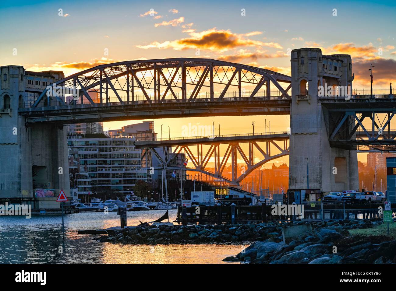 Burrard and Granville Bridges over False Creek at sunrise, Vancouver, British Columbia, Canada Stock Photo