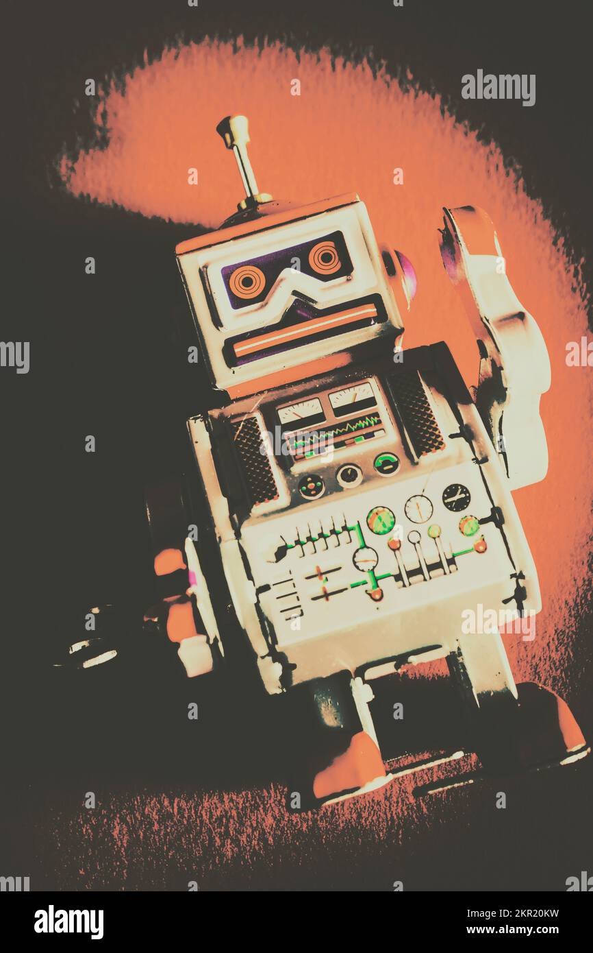 Error 404 in the design of a malfunctioned broken retro tin robot in posterised form. Android short circuit Stock Photo