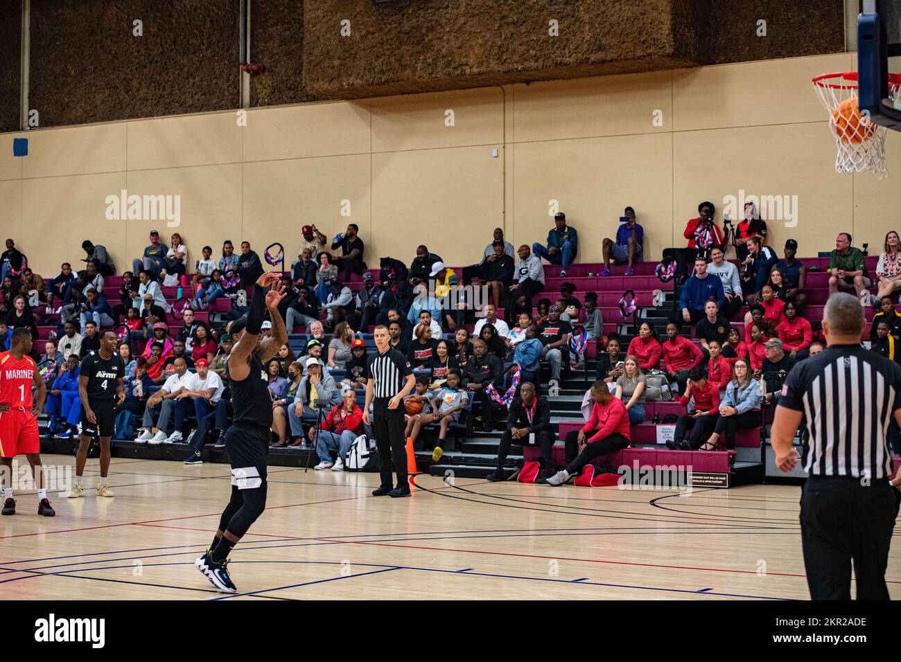U.S. Army 1st Lt. Freddie Nichols, a member of team Army, shoots a free