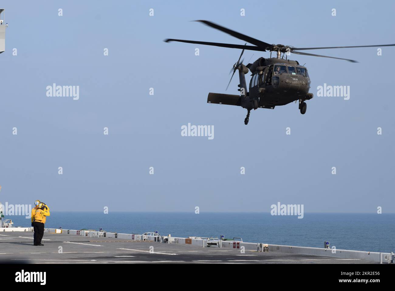 U.S. Navy aviation boatswain's mate (handling) coordinates the